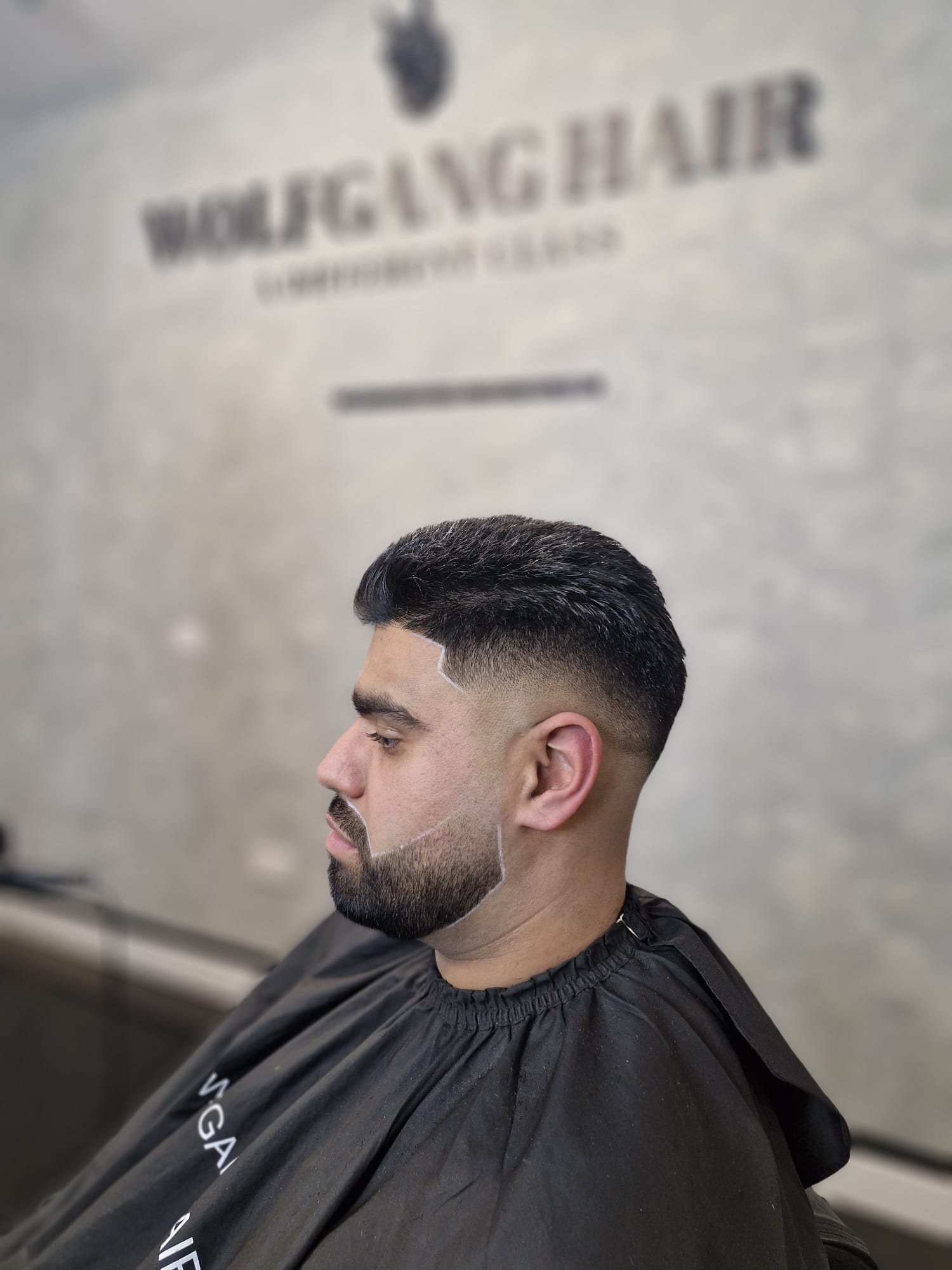 Low fade with beard lineup
